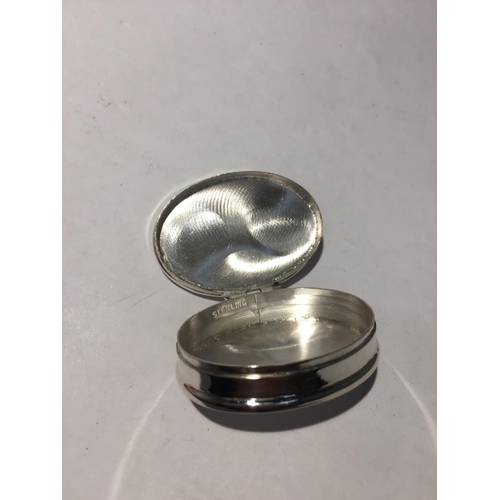 617 - A MARKED 925 SILVER PILL BOX WITH AN ENAMEL  EROTIC DESIGN TOP