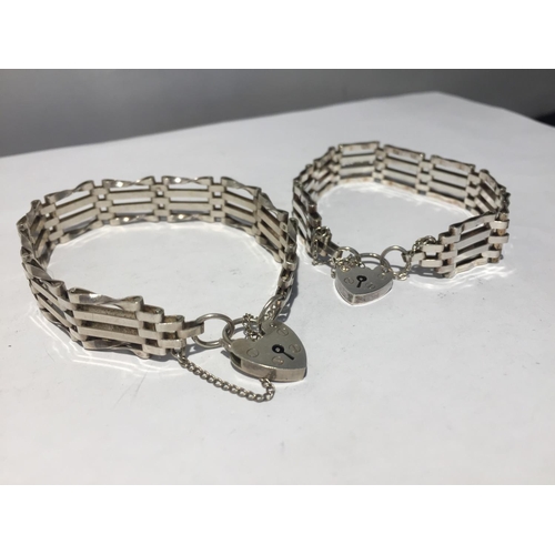 626 - TWO SILVER GATE BRACELETS