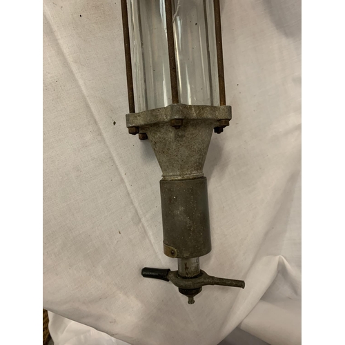 175 - A VINTAGE GLASS MOTORCYCLE OIL PUMP