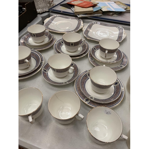 197 - A COLLECTION OF CHINA WARE TO INCLUDE CUPS, SAUCERS AND SIDE PLATES