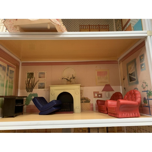 315A - A VERY LARGE THREE STOREY SINDY DOLLS HOUSE WITH ROOF TOP TERRACE TO INCLUDE SINDY FURNITURE