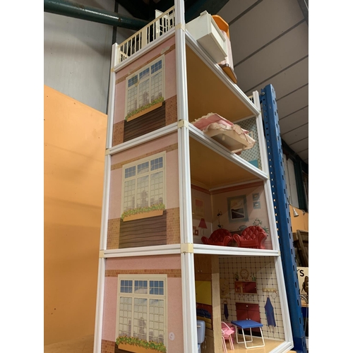 315A - A VERY LARGE THREE STOREY SINDY DOLLS HOUSE WITH ROOF TOP TERRACE TO INCLUDE SINDY FURNITURE