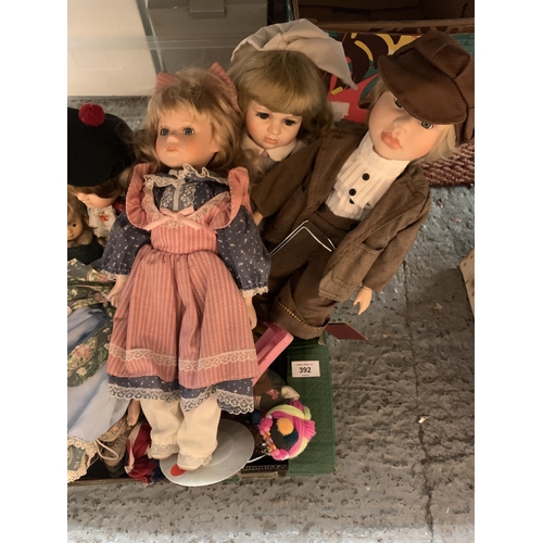 392 - A LARGE SELECTION OF COLLECTABLE DOLLS