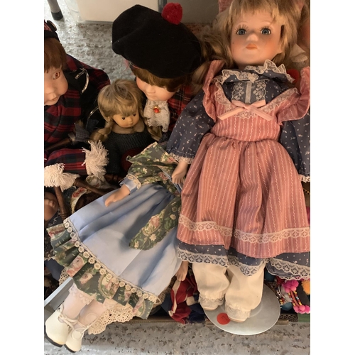 392 - A LARGE SELECTION OF COLLECTABLE DOLLS