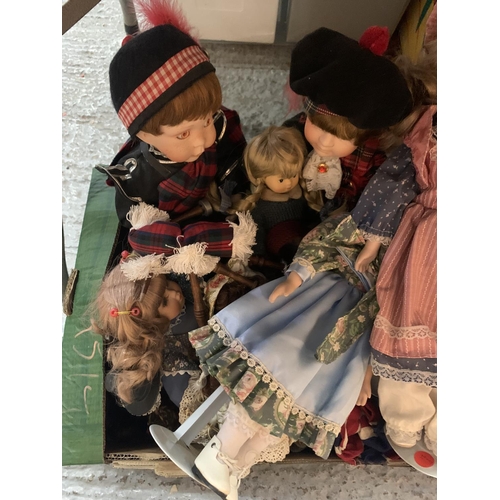 392 - A LARGE SELECTION OF COLLECTABLE DOLLS