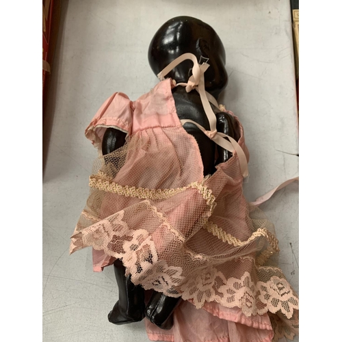 395 - A VINTAGE DOLL