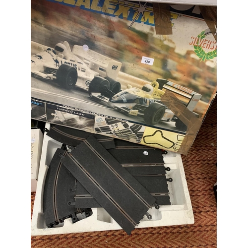 428 - AN EXTENSIVE COLLECTION OF SCALEXTRIC TO INCLUDE A VARIETY OF TRACKS AND CARS ETC