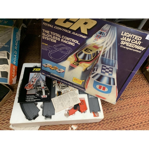 433 - A BOXED TCR TOTAL CONTROL RACING TRACK AND CARS AND A BOXED KADER ROAD RACING TRACK AND CARS