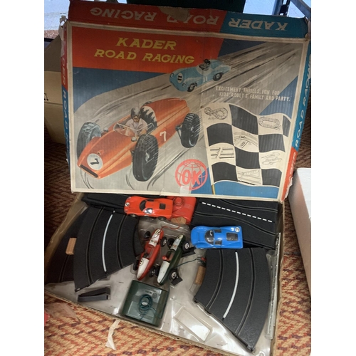 433 - A BOXED TCR TOTAL CONTROL RACING TRACK AND CARS AND A BOXED KADER ROAD RACING TRACK AND CARS