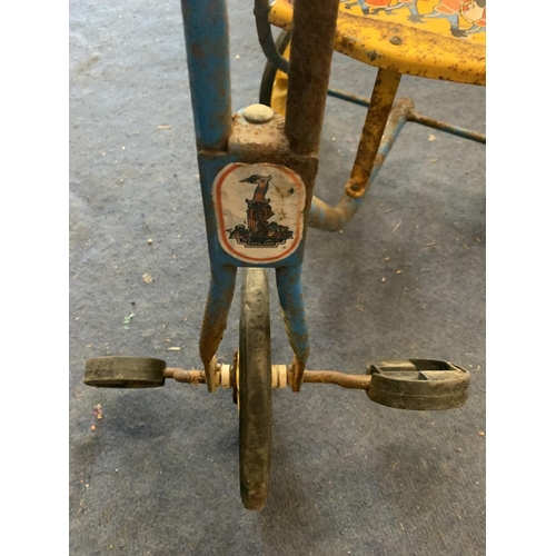 437 - A VINTAGE TRICYCLE WITH A BUSBY BAND DECORATION