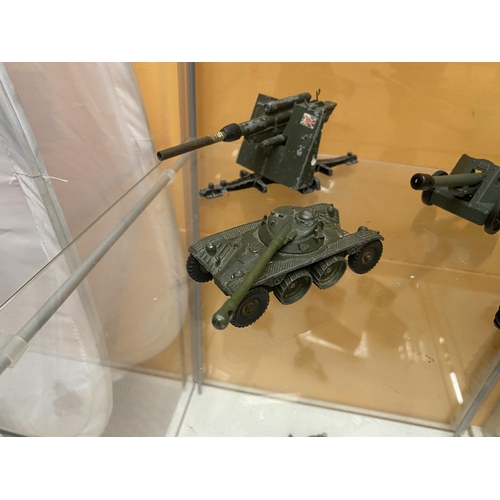 485 - FOUR UNBOXED DINKY MODEL MILITARY VEHICLES - AN EBR PANHARD AND THREE FIELD GUNS