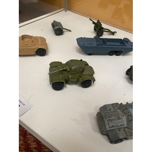 486 - SEVEN UNBOXED DINKY MODEL MILITARY VEHICLES - FOUR ARMOURED CARS, FIELD GUN ETC