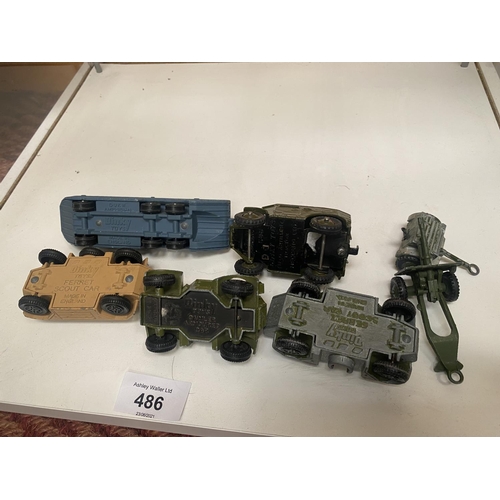 486 - SEVEN UNBOXED DINKY MODEL MILITARY VEHICLES - FOUR ARMOURED CARS, FIELD GUN ETC