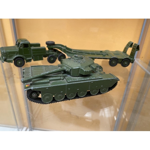 489 - THREE UNBOXED DINKY MODEL MILITARY VEHICLES - A CENTURIAN TANK AND A TANK TRANSPORTER