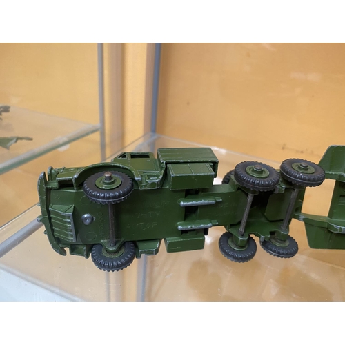 489 - THREE UNBOXED DINKY MODEL MILITARY VEHICLES - A CENTURIAN TANK AND A TANK TRANSPORTER