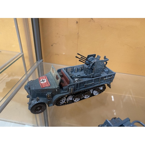 493 - FOUR UNBOXED CORGI MODEL MILITARY VEHICLES - A HANOMAG ROCKET LAUNCHER, A QUAD GUN TRACTOR, AN SD,KI... 