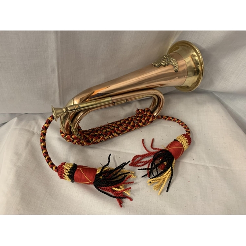 17 - A BRASS AND COPPER ARMY STYLE BUGLE