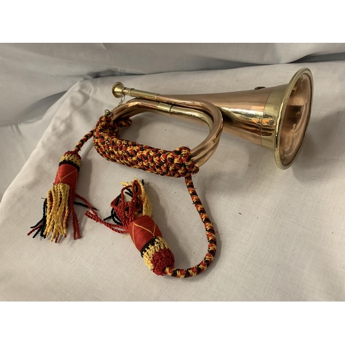 17 - A BRASS AND COPPER ARMY STYLE BUGLE