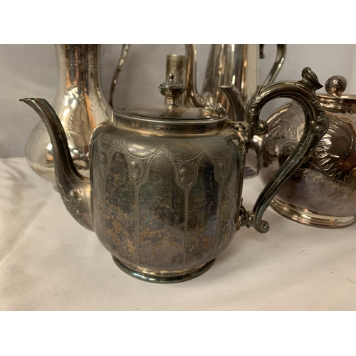 39 - A COLLECTION OF EPNS AND SILVER PLATE ITEMS TO INCLUDE HANDLED TRAY, TWO COFFEE POTS AND TWO TEA POT... 