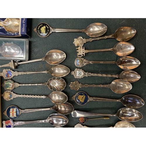 54 - A LARGE COLLECTION OF SOUVENIR SPOONS AND A BOXED SET OF FRUIT SPOONS WITH SERVING SPOON