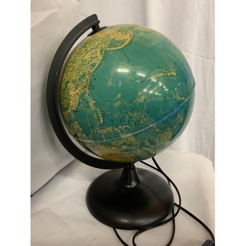 63 - AN ELECTRIC LIGHT UP GLOBE