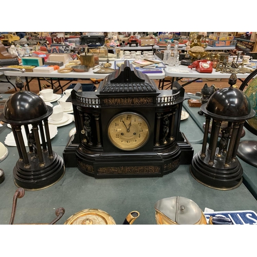 64 - A LARGE DECORATIVE POLISHED SLATE OVER MANTEL CLOCK WITH EMBOSSED COPPER DEPICTING ROMAN SCENES 50CM... 