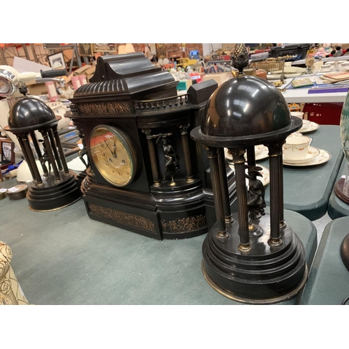 64 - A LARGE DECORATIVE POLISHED SLATE OVER MANTEL CLOCK WITH EMBOSSED COPPER DEPICTING ROMAN SCENES 50CM... 