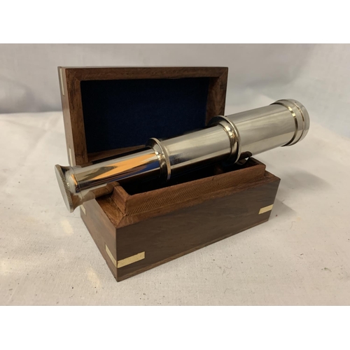 68 - A CHROME TELESCOPE IN WOODEN HINGED BOX WITH BRASS DETAILING