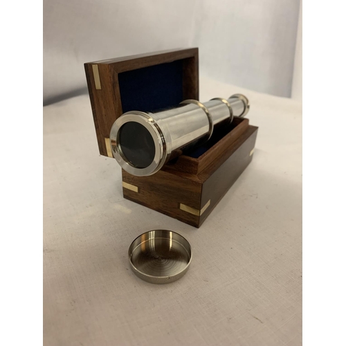 68 - A CHROME TELESCOPE IN WOODEN HINGED BOX WITH BRASS DETAILING