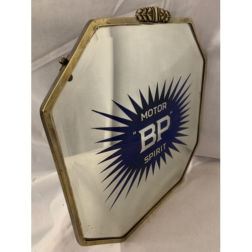 84 - A MOTOR 'BP' SPIRIT BRASS FRAMED MIRROR 36CM X 37.5CM (CHIP TO GLASS)