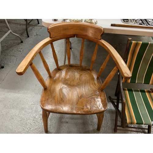 93 - AN OAK CAPTAINS ARMCHAIR