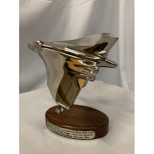 94 - A CHROME VULCAN BOMBER ON WOODEN BASE WITH INSCRIPTION