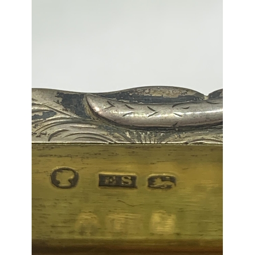 517 - A HALLMARKED BIRMINGHAM SILVER BOX  WITH A PAIR OF YELLOW METAL BOOT CHARMS