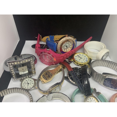 525 - A LARGE COLLECTION OF VARIOUS FASHION WATCHES