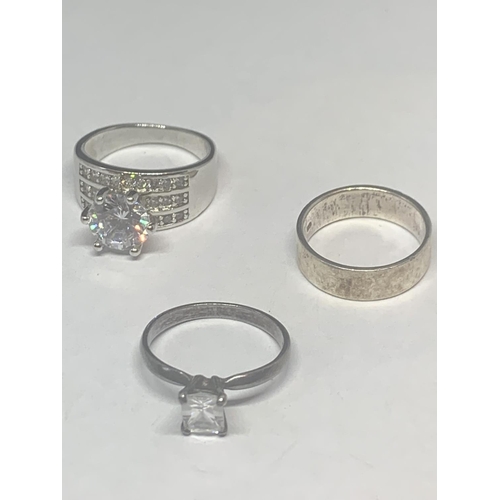 655 - FIVE SILVER RINGS TO INCLUDE CLEAR, GREEN AND OPAL STONE EXAMPLES