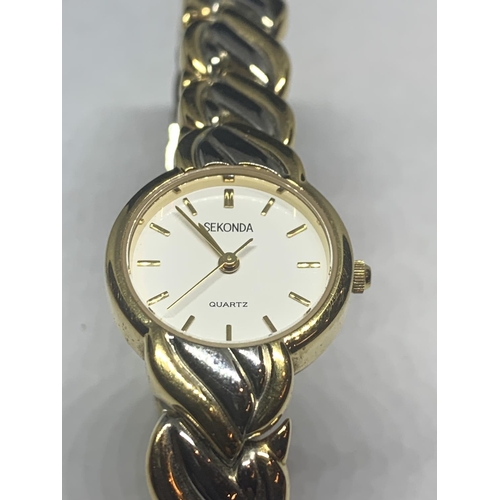 673 - A SEKONDA YELLOW METAL WRIST WATCH SEEN WORKING BUT NO WARRANTY