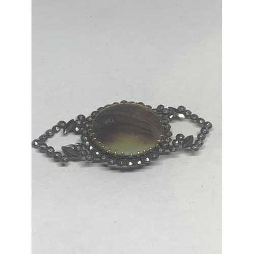 674 - A 19TH CENTURY STEEL CUT BROOCH WITH A PRESENTATION BOX