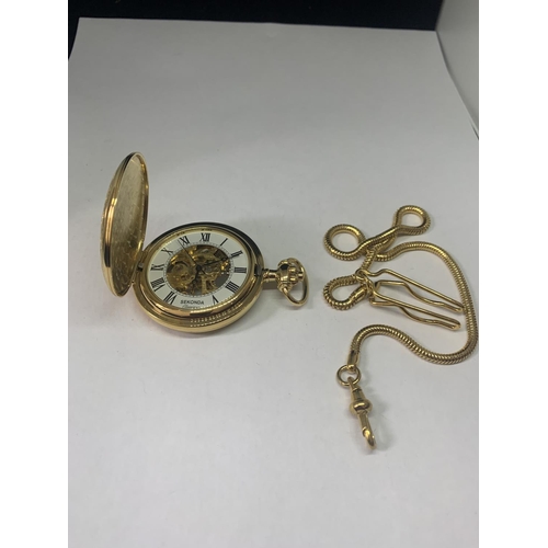 688 - A YELLOW METAL SEKONDA POCKET WATCH AND CHAIN IN A PRESENTATION BOX