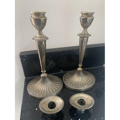 695 - A PAIR OF HALLMARKED BIRMINGHAM CANDLESTICKS WITH WEIGHTED BASES H: 24CM