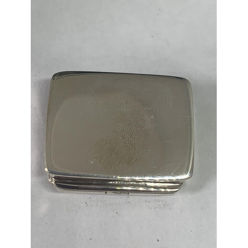 700 - A MARKED SILVER PILL BOX WITH AN EROTIC DESIGN LID