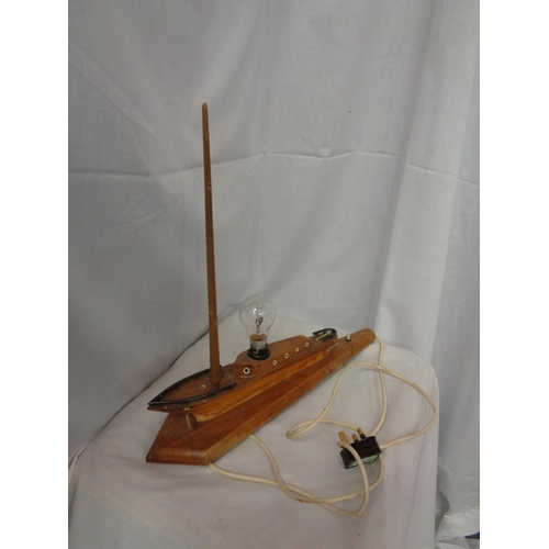 828 - A WOODEN SHIP TABLE LAMP