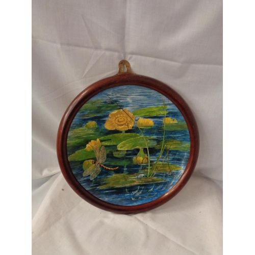 843 - A FRAMED CHARGER DEPICTING A POND SCENE WITH DRAGONFLY