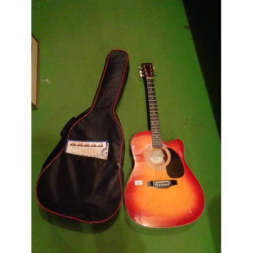 846 - AN ENCOURE ENC165EAR ACCOUSTIC GUITAR WITH CASE AND MUSIC BOOK