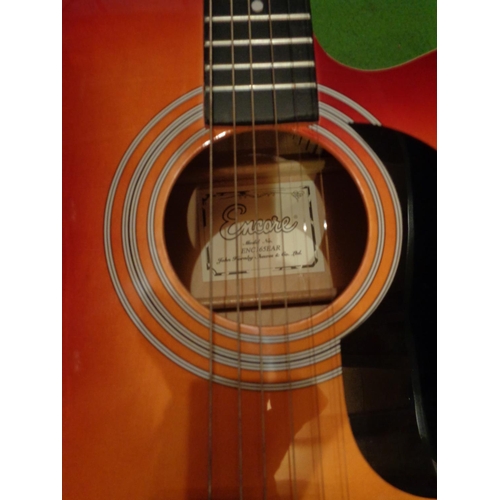 846 - AN ENCOURE ENC165EAR ACCOUSTIC GUITAR WITH CASE AND MUSIC BOOK