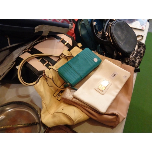 848 - A SELECTION OF HANDBAGS, PURSES AND BAGS