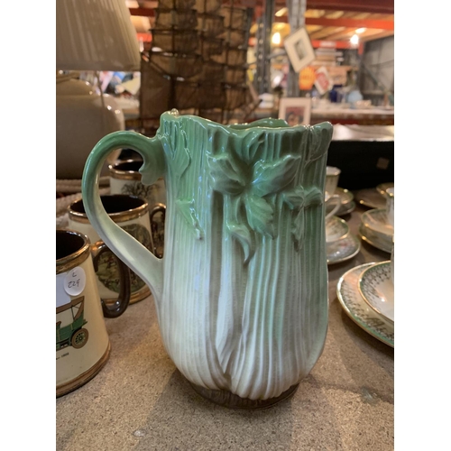 291A - A SYLVAC GREEN AND CREAM CELERY JUG