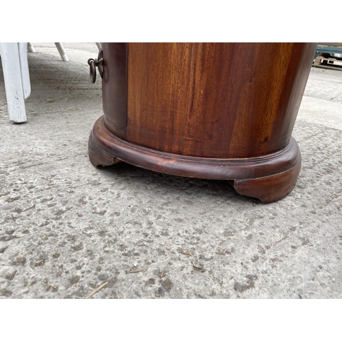 2451 - A CYLINDRICAL MAHOGANY CHEST OF FIVE DRAWERS