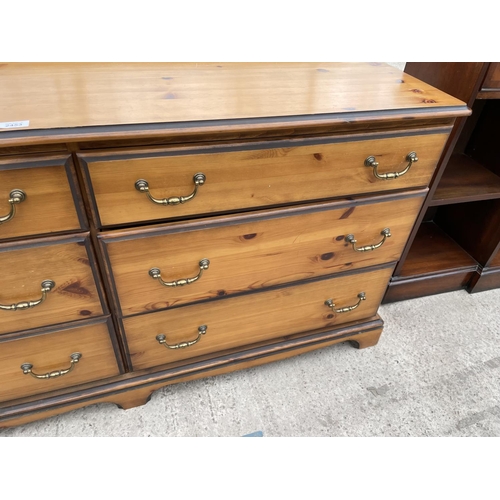 2453 - A MODERN LANCASHIRE STYLE CHEST OF SIX DRAWERS