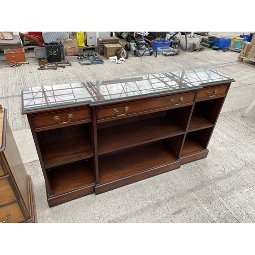 2454 - A MAHOGANY BREAKFRONT BOOKCASE