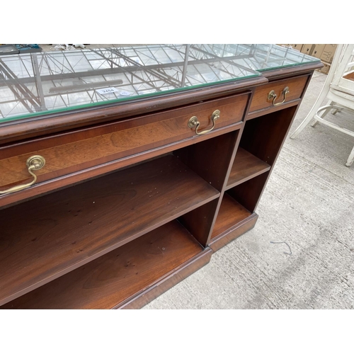 2454 - A MAHOGANY BREAKFRONT BOOKCASE